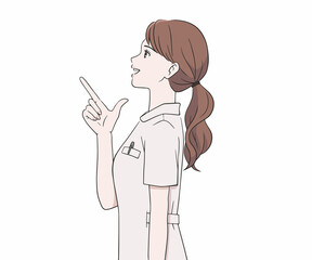 指を差す笑顔の看護師