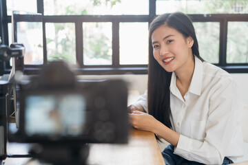 Influencer and content creator in digital marketing concepts. Young woman arecord video content to her channel.