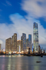 Obraz na płótnie Canvas Night scene of skyline and harbor of Hong Kong city