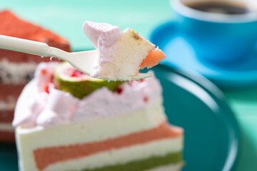 eating sweet cakes and cup of coffee horizontal composition