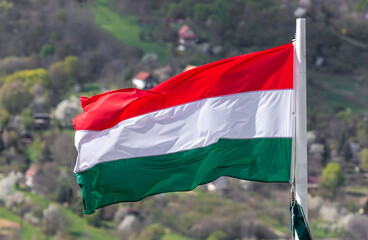 a close-up of the Hungarian flag fluttering in the wind