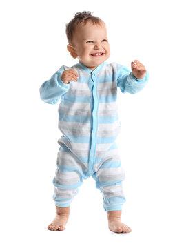 Little Baby Boy Learning To Walk On White Background