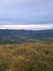Naklejka premium clouds over the mountains