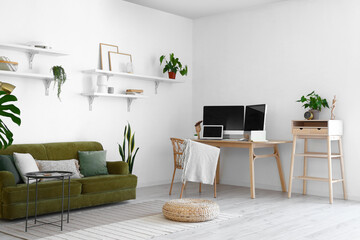 Modern workplace in stylish room interior