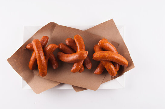 Many Smoked Sausages om Paper; From Above