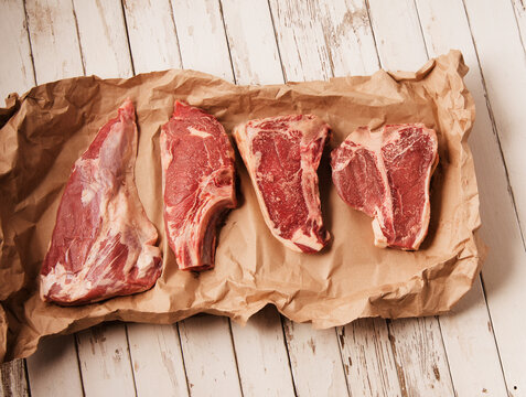 T bone steaks in parchment paper