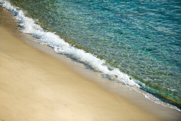 Ocean or sea tropical waves. Ocean background, seascape. Tropical beach with wave, nature background. Copy space of summer vacation and travel concept.