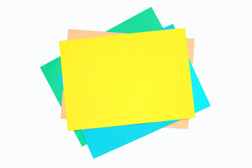 Colorful paper on white background. Copy space