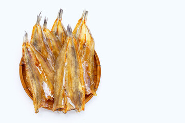 Sun dried black kingfish on white background.