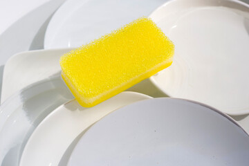 Dish washing, Dirty dishes soaking in kitchen sink.