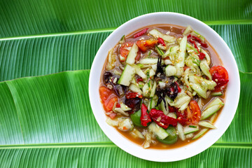 Spicy cucumber salad in plate