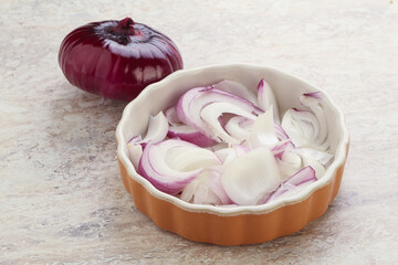 Sliced red onion in the bowl