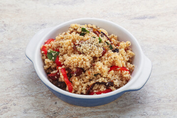 Arabic cous cous with meat and tomato