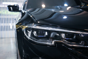 Obraz na płótnie Canvas black car headlights