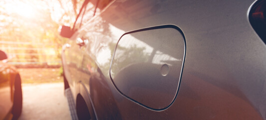 Close-up, fuel tank cap and copyspace, warm glow