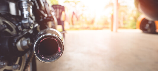 rear view of motorcycle The exhaust pipe is the focus.