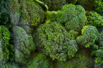 Broccoli put on a shelf for sale within a market