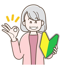 初心者マークを持つシニア女性のイラスト