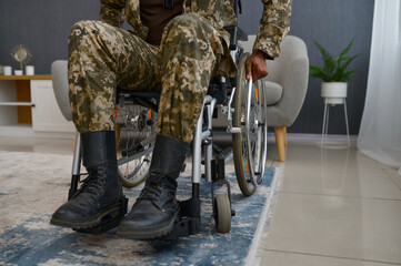 Obraz na płótnie Canvas War veteran with disability sitting in wheelchair