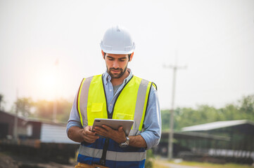 Railway engineer caucasian man are on duty and discussed by using tablet in the job site of train...