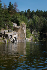 Fototapeta premium Ukraine Korostyshev granite quarry Blue lake in the forest