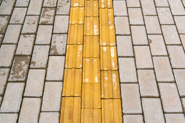Tactile paving for blind handicap on tiles pathway