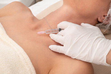 Obraz na płótnie Canvas Mesotherapy is a popular cosmetic procedure that helps to rejuvenate the delicate skin of the neck and décolleté. The impact of vitamin cocktails, compiled by a doctor, taking into account the conditi
