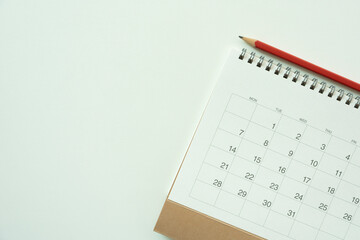 close up of calendar on the whitew table background, planning for business meeting or travel...