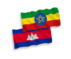 National vector fabric wave flags of Kingdom of Cambodia and Ethiopia isolated on white background. 1 to 2 proportion.