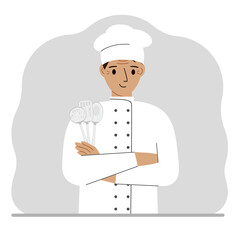 Smiling chef holds a kitchen cutlery set in his hand. profession.