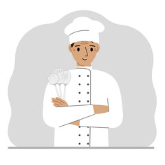 Smiling chef holds a kitchen cutlery set in his hand. profession.