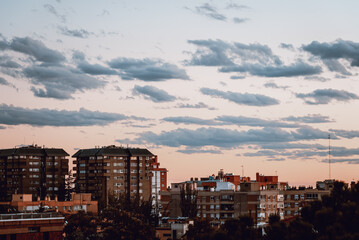 Cityscape of upscale luxury neighborhood in Madrid. Arturo Soria area. View at sunset. Real estate and residential market concept