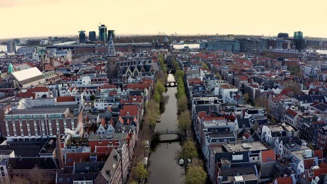 Aerial Opening view of Amsterdam Capital city center De Wallen with canals, Netherlands