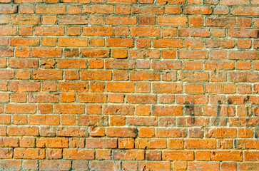 An old yellow brick wall.