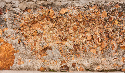 A stone, concrete wall in the section. Beautiful close-up background.