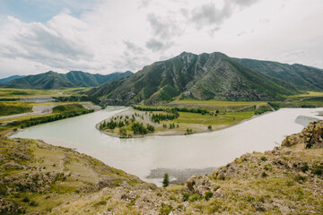 Confluence of Chuya and Katun rivers in Altai mountains, Siberia, Russia. Summer landscape. Famous tourist destination