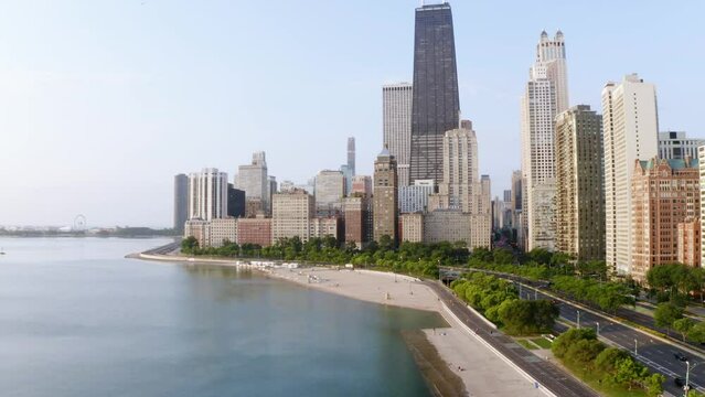 Drone Shot of Downtown Chicago Above Lake Michigan, Skyscrapers in Background