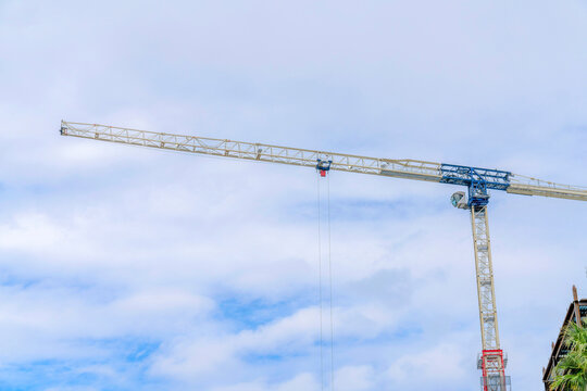 Tower crane against the sky at Silicon Valley in San Jose bay area, California