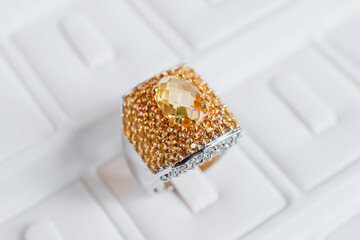 Citrine ring is on display . It is a yellow corundum gemstone . Important topaz sources are...
