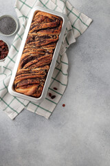 Sweet swirl homemade bread with poppy seeds