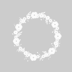 floral frame made of white flowers. round wreath of white petals and herbs.