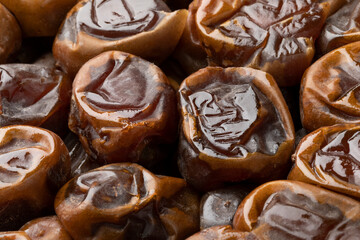 Traditional Arabic Sukari dates close up full frame