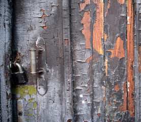 Cracked paint on a wooden door