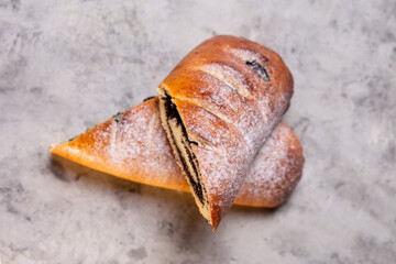 delicious roll with poppy seeds on top view