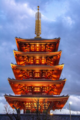 View of the five-story pagoda of the Senso-ji ancient Buddhist temple dedicated to Kannon Bosatsu,...
