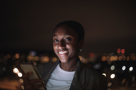 Portrait of businesswoman with smart phone