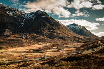 A landscape photograph of hiking through Glencoe in the Scottish Highlands.