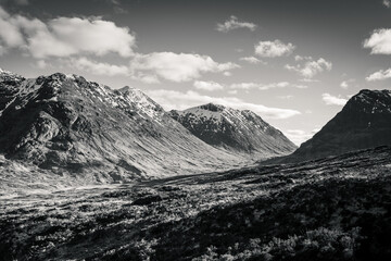 Fototapeta na wymiar A landscape photograph of hiking through Glencoe in the Scottish Highlands.