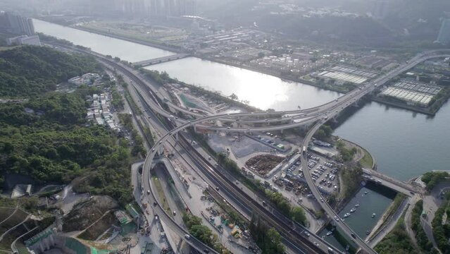 Aerial footage of highway and road at Shing Mun River and Ma On Shan, Hong Kong