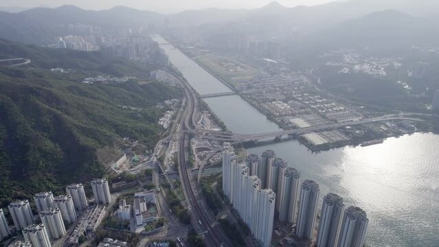 Aerial footage of highway and road at Shing Mun River and Ma On Shan, Hong Kong